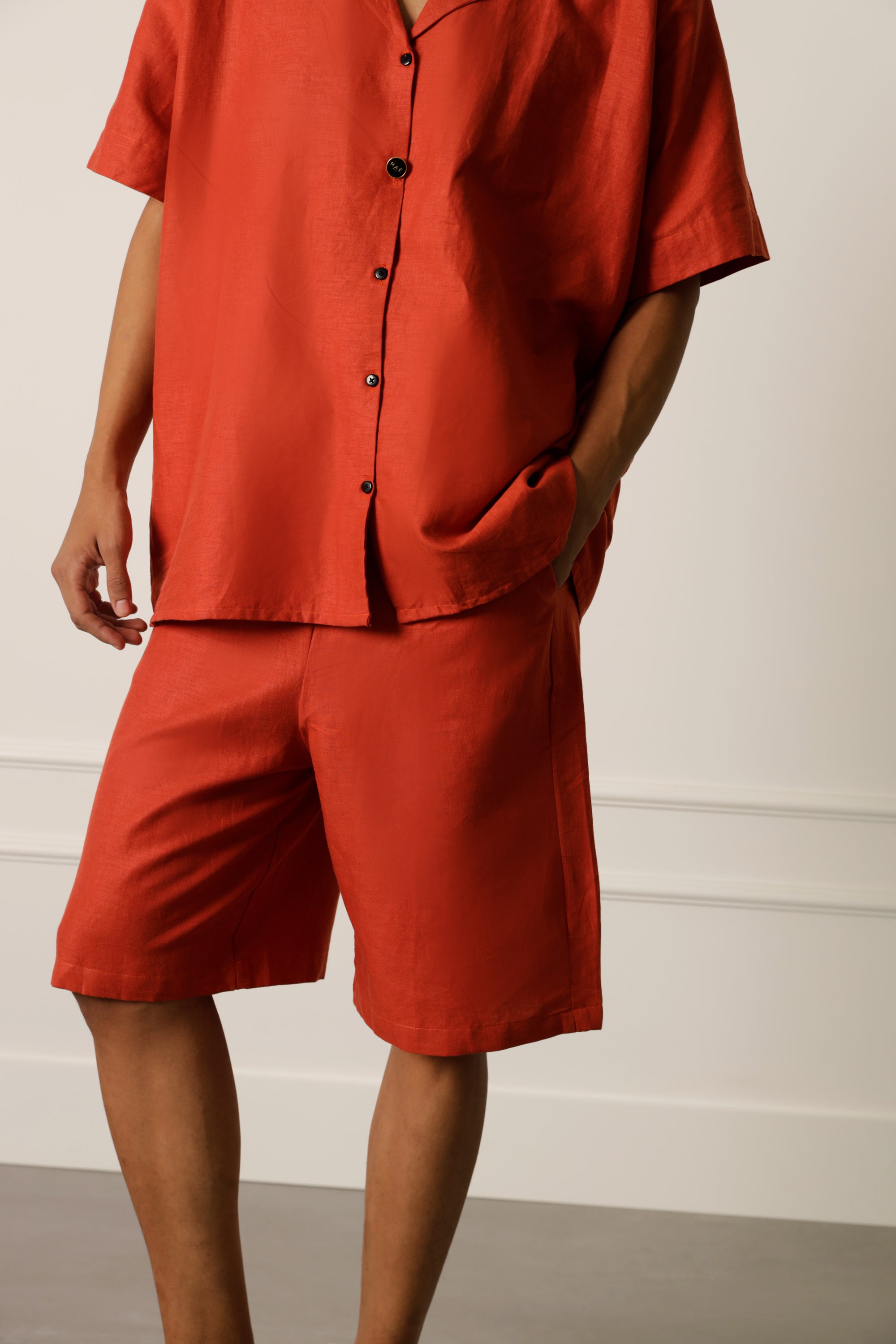 Orange bermuda shorts in linen